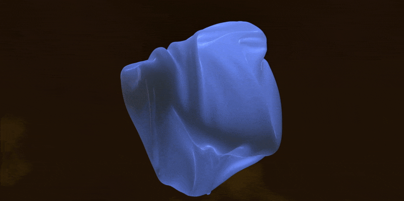 Eine blaue, gewellte, formlose Masse auf braunem Hintergrund.